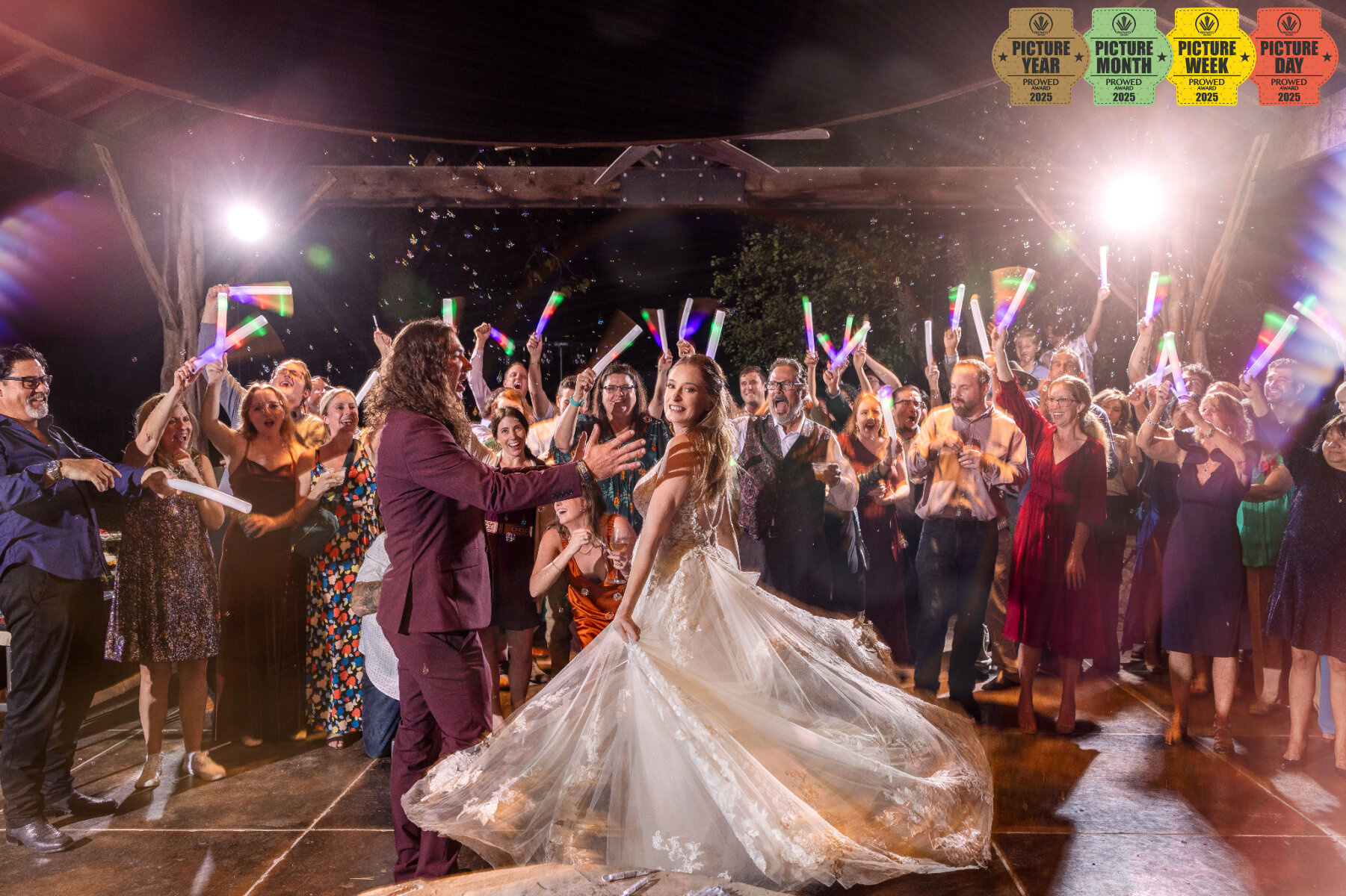 Wedding reception exit with guests holding glow sticks, GR Weddings